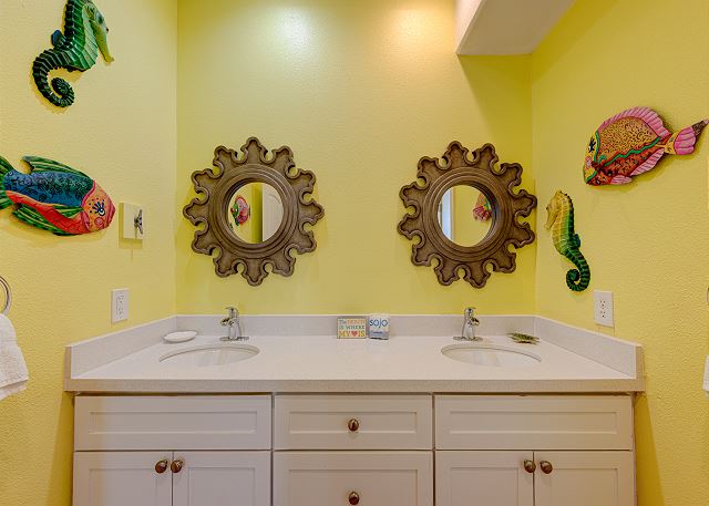 Double vanity with colorful sea life motifs