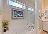 Ensuite with walk in shower and jacuzzi tub