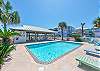 Community pool with covered patio