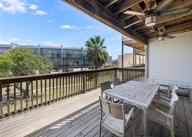 Enjoy the breeze and view from the deck with area to sit and dine