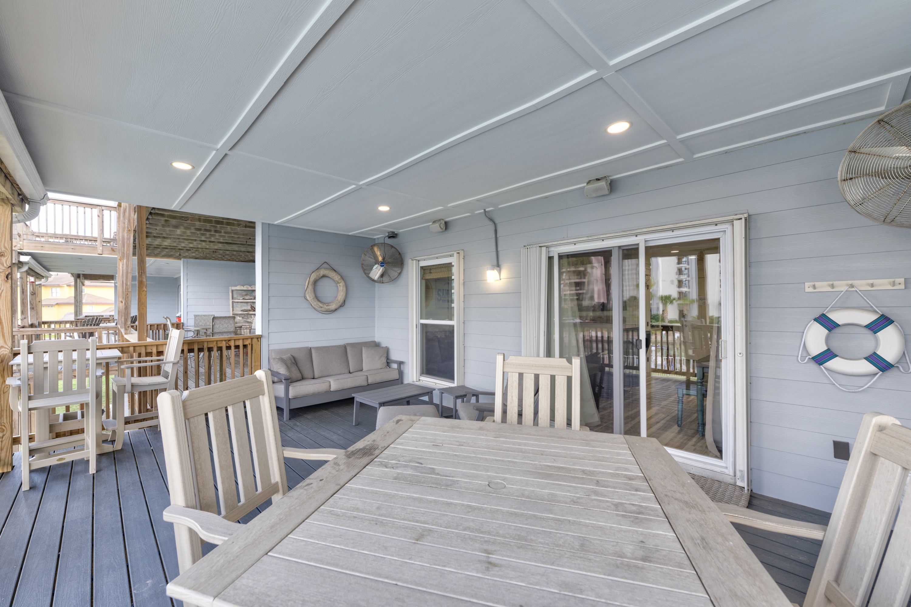 Deck dining meets coastal beauty—gulf views included
