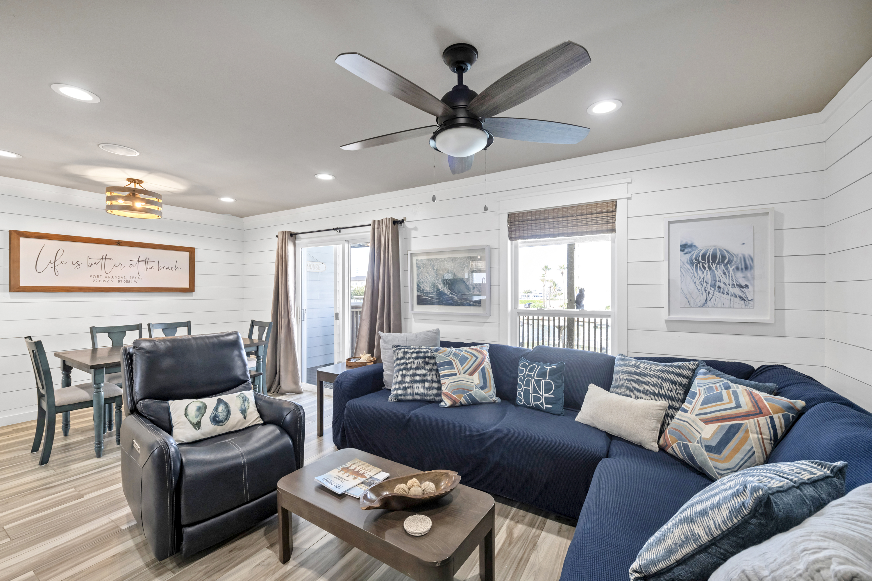 Relax and dine in this open living area, just steps from the deck.