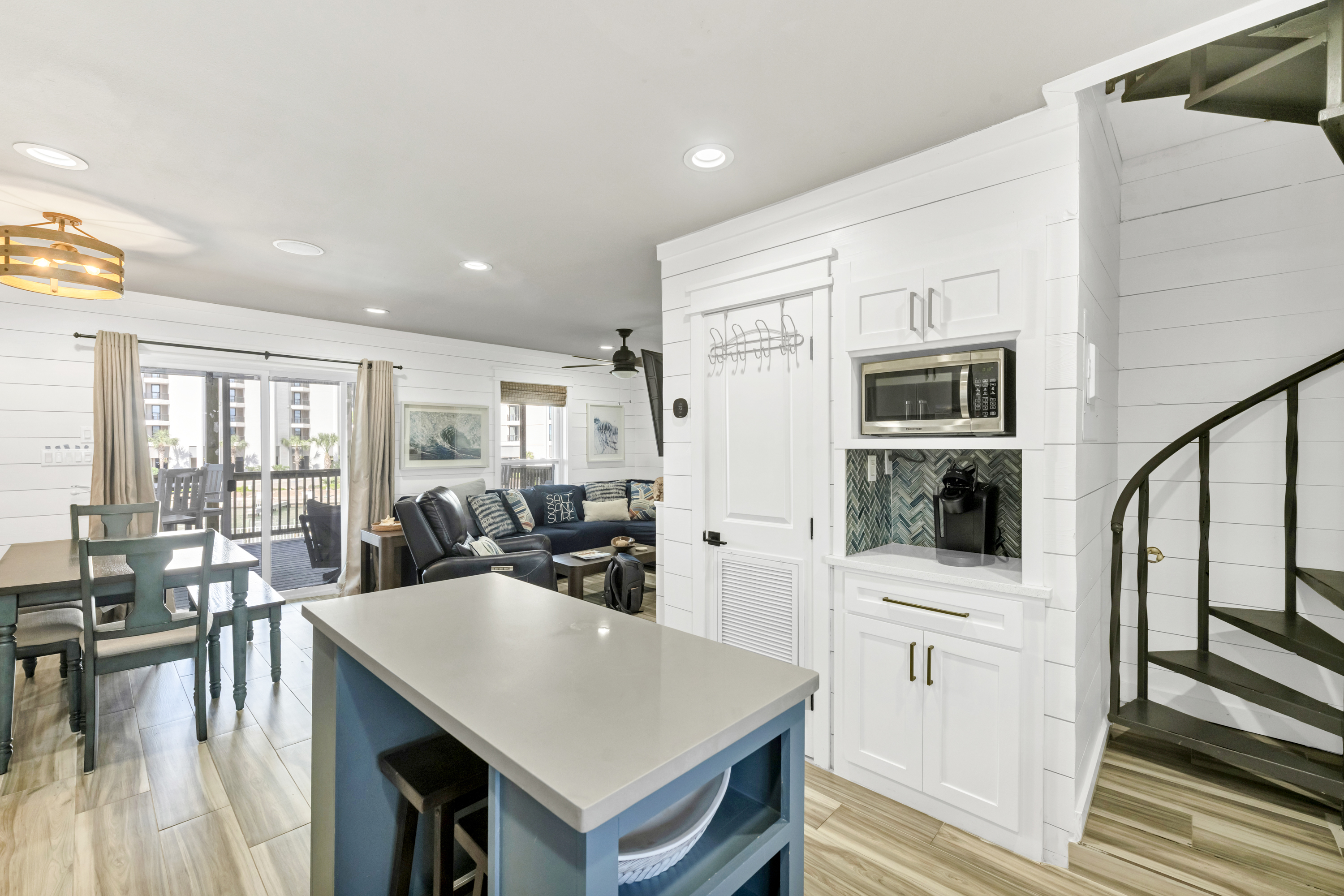 Enjoy your cup of coffee with this convenient coffee bar under the microwave.