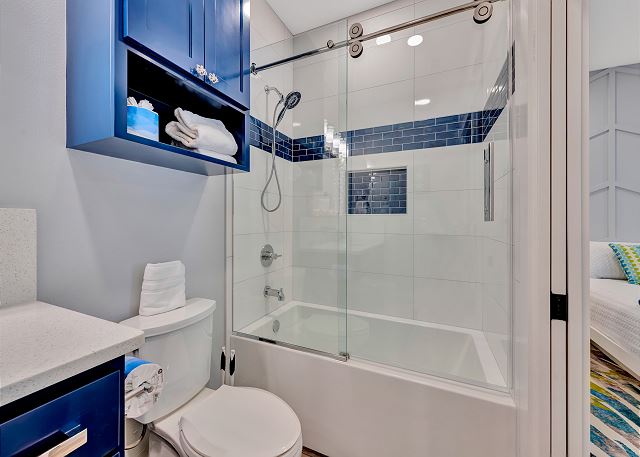Full bathroom with tub shower combo