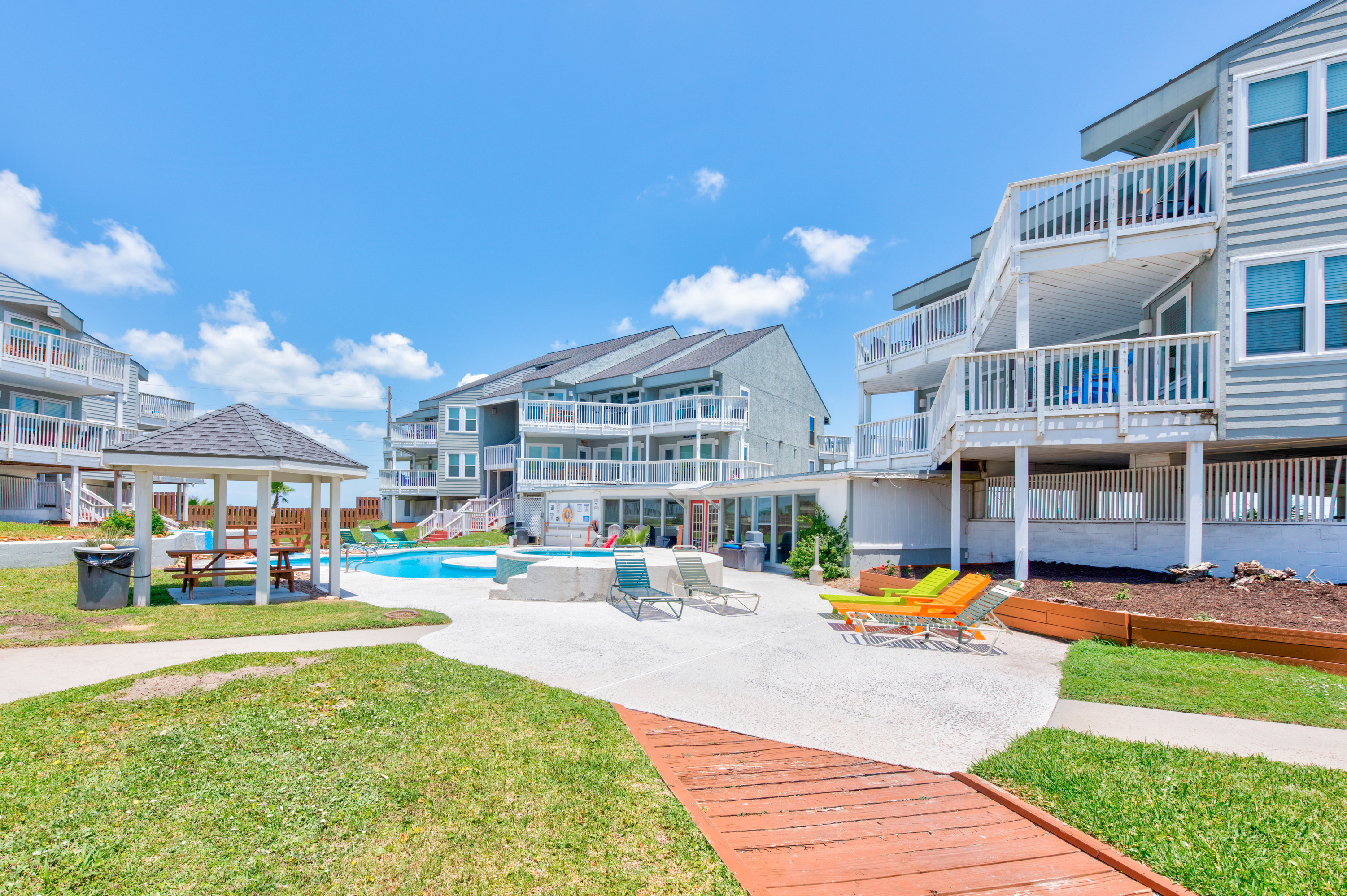Community loungers poolside