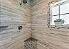 Walk in shower in ensuite bathroom