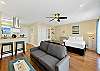 view of sleeper sofa to queen bed