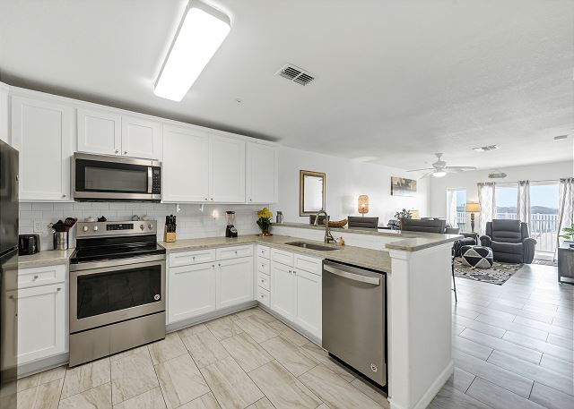 Experience culinary charm in this cozy kitchen, where efficiency meets elegance