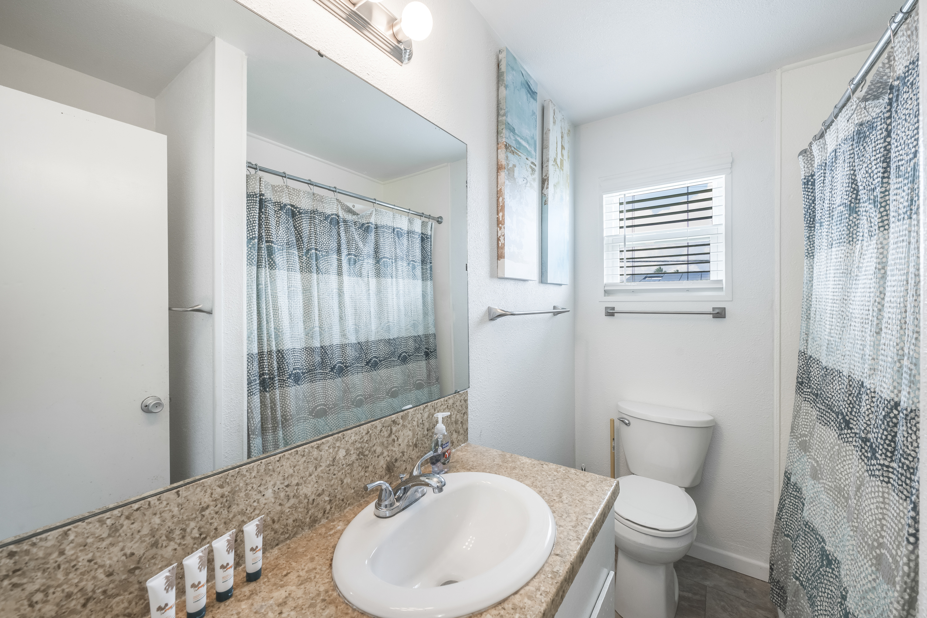 A tidy, modern bath designed for comfort and convenience