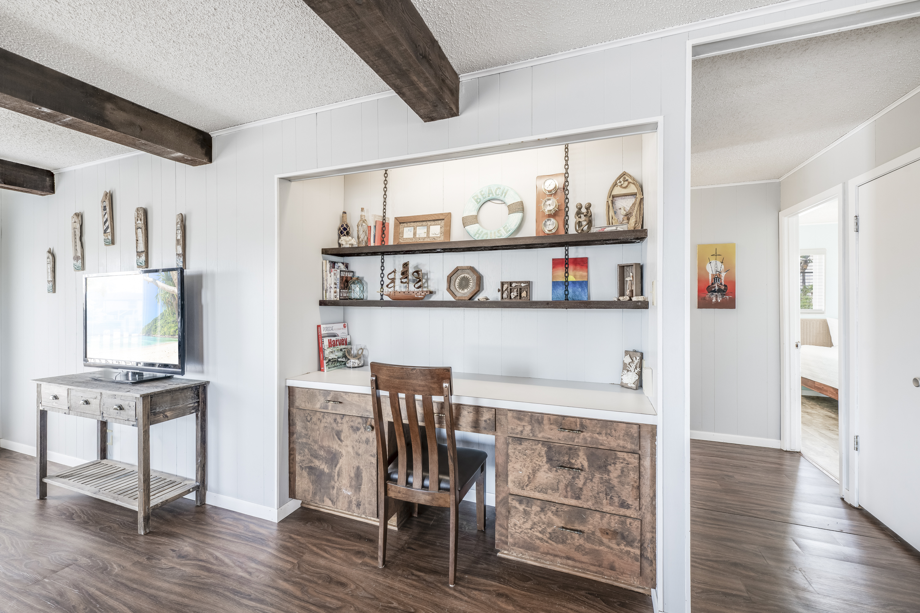 A charming built-in desk for easy vacation planning or remote work