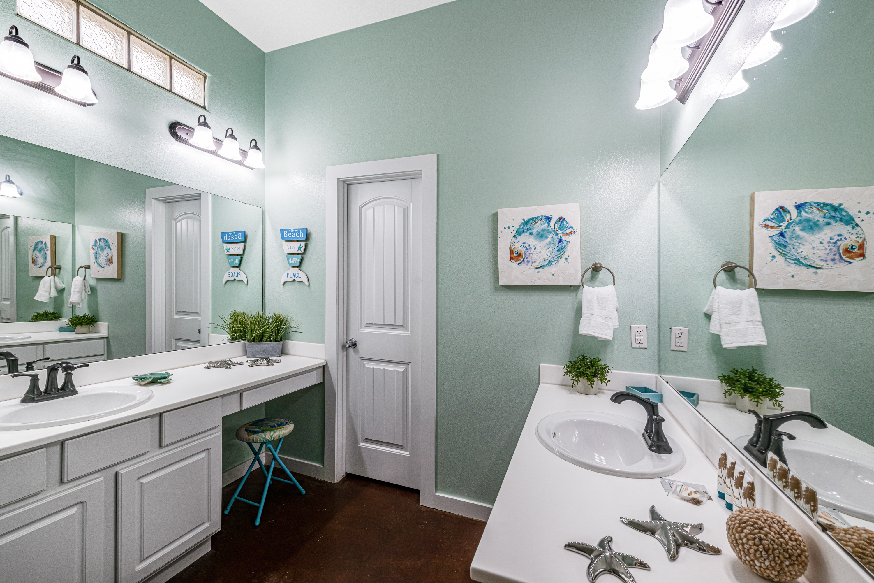 Primary Queen Suite''s Double Vanity Full Bath with Sea Life Accents