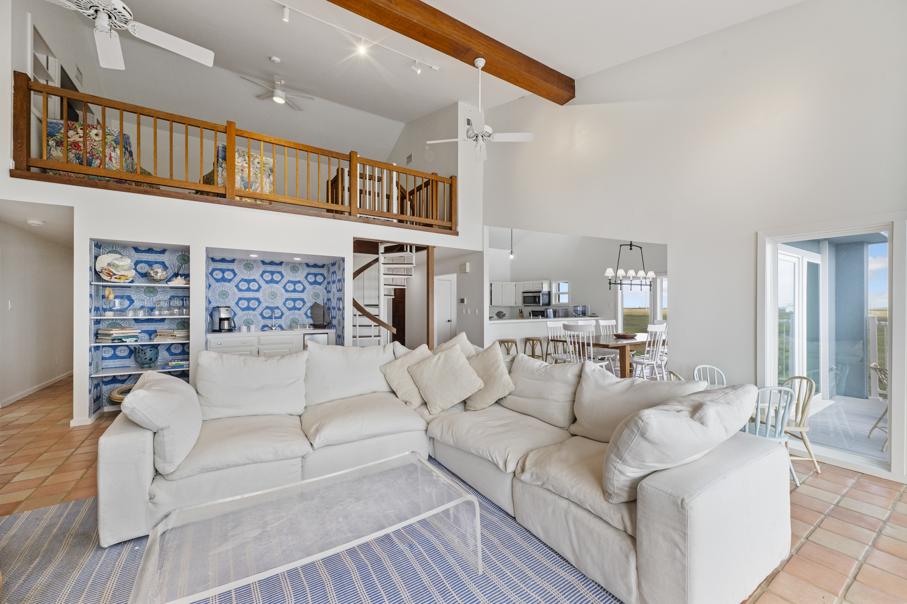 Spacious & Sunlit: Flowing Living, Dining, and Kitchen Areas 