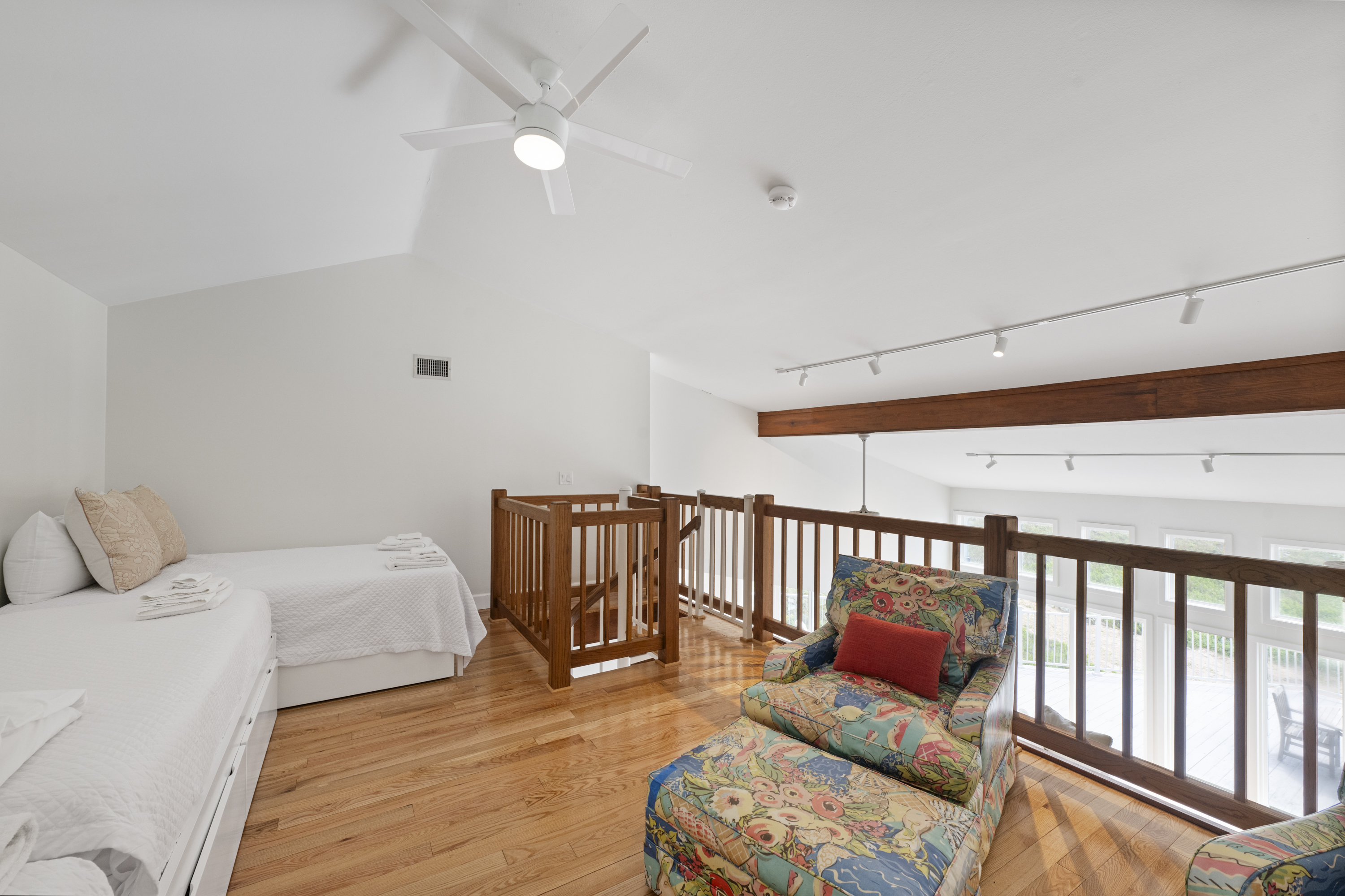 Spiral Staircase leads to Hidewaway Lofted Comfort, Perfect for Making Endless Memories! 