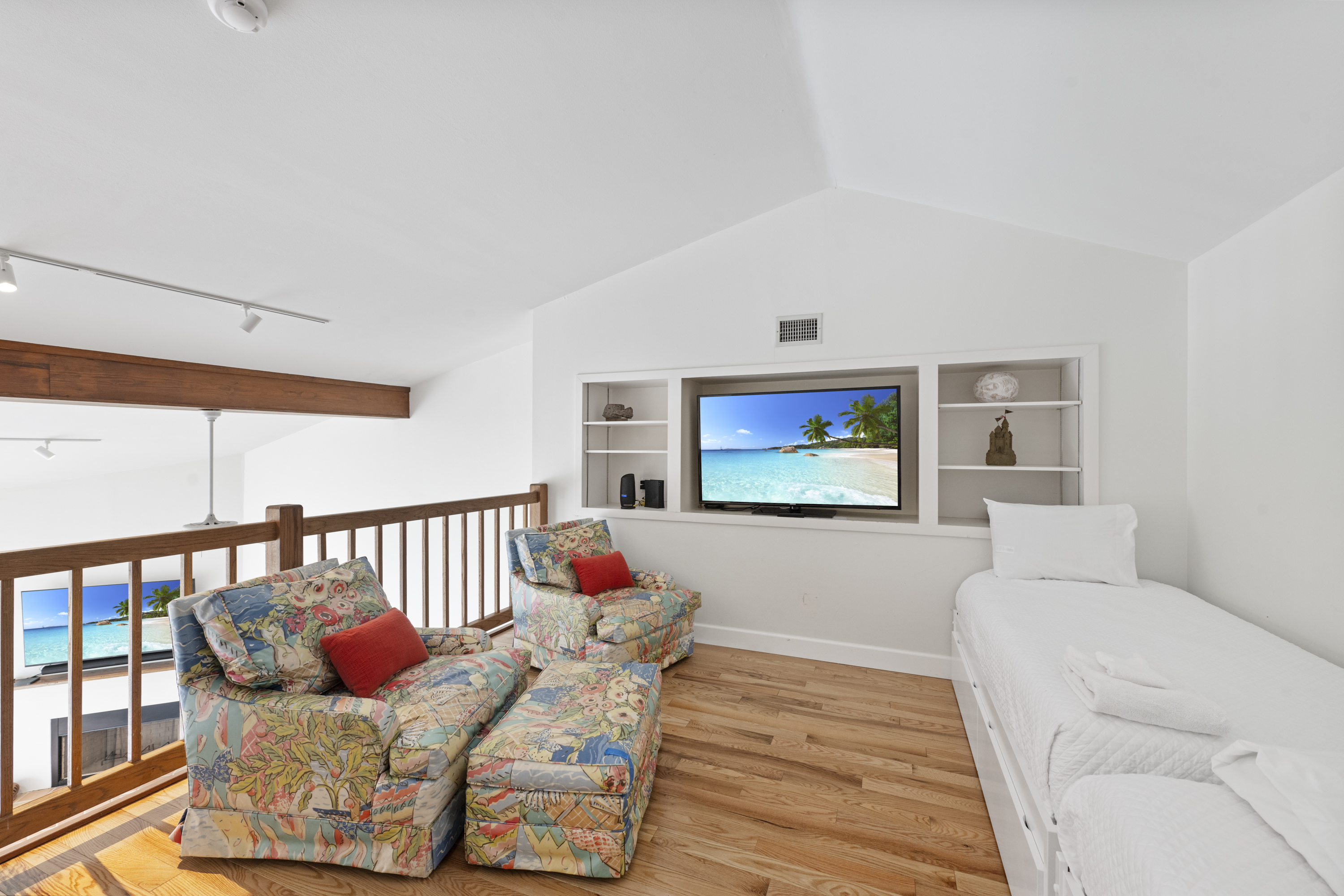 Elevated Social Space - Loft Equipped with TV, a Couple Seat to Lounge, 2 Twins and a Full-Size Bed