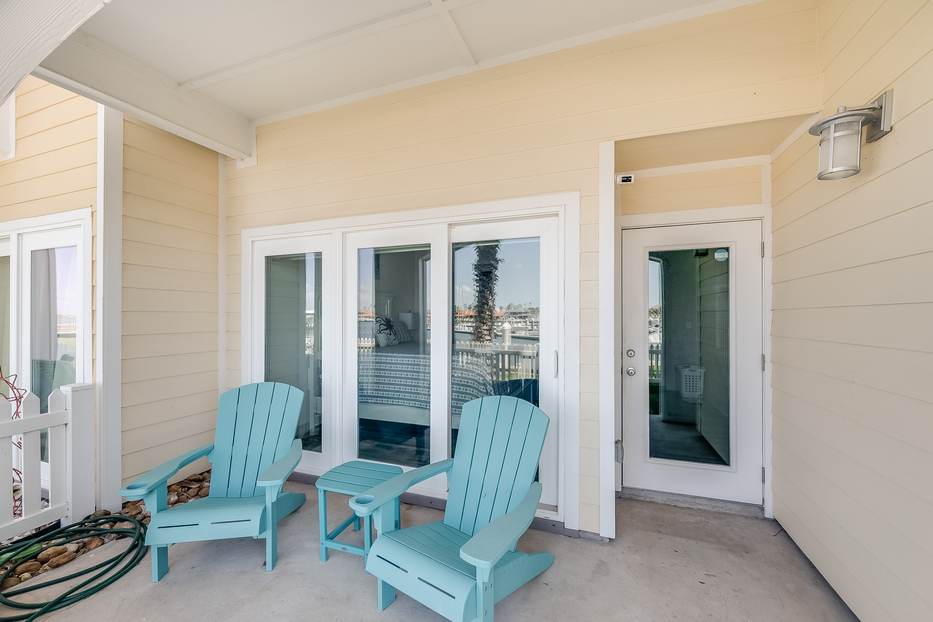 First Level Adirondack Seating with Marina Views- Coastal Comforts Start Right Outside Your Door