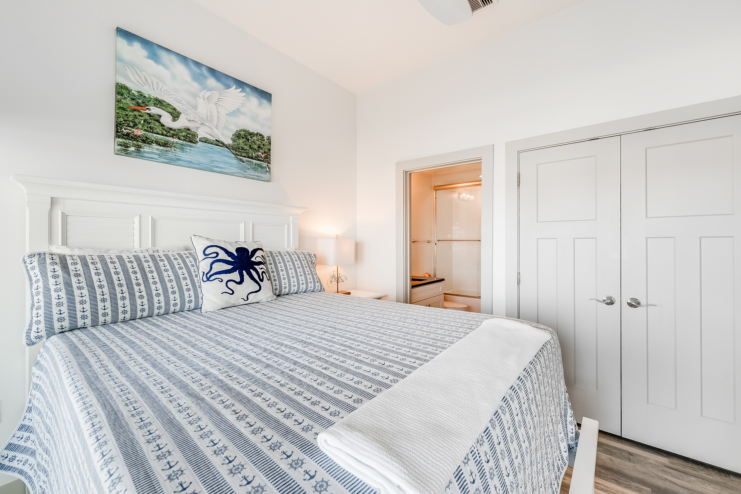 Marina Views are Bountiful and Illuminate This First Level Queen Bedroom with Attached Full Bath 