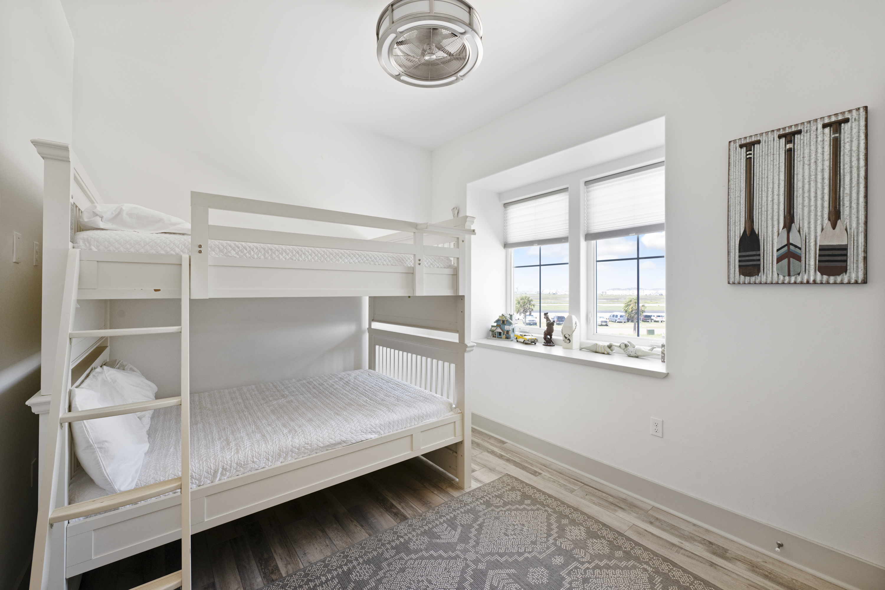 Cozy 2nd Floor Bunk Room with Full-Over-Full Beds and A Coastal Theme