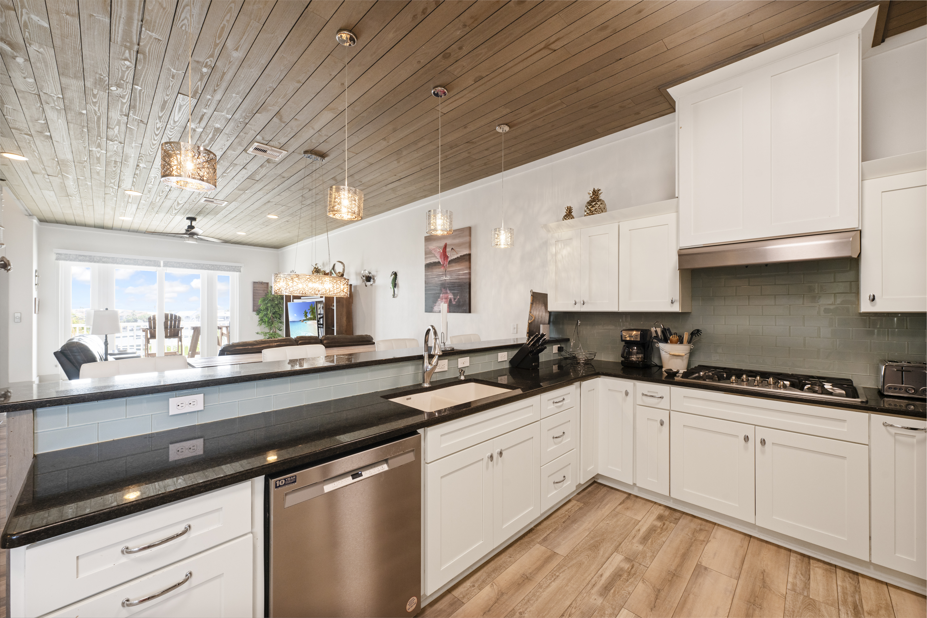 Well-Equipped Kitchen Overlooking Open Dining and Living Areas