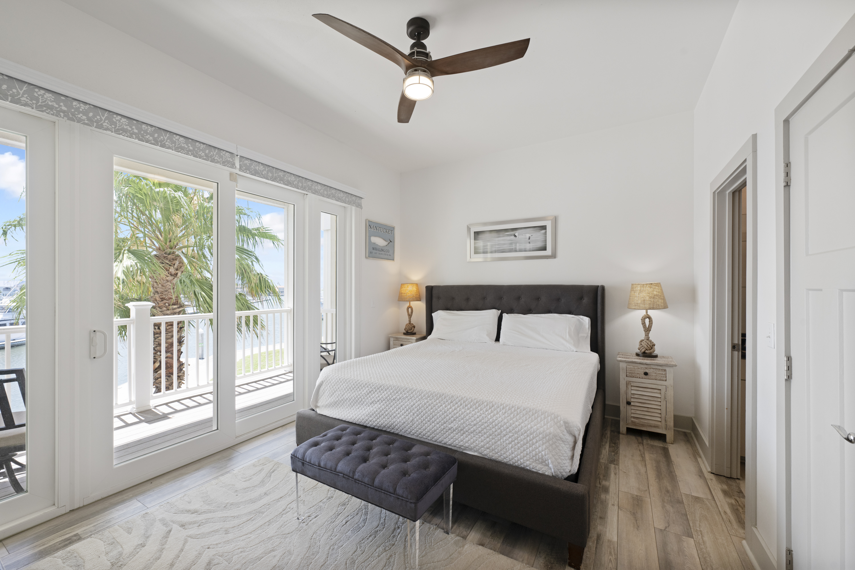 Wake Up to Waterfront Views - Primary King Suite with Private Balcony Overlooking Marina