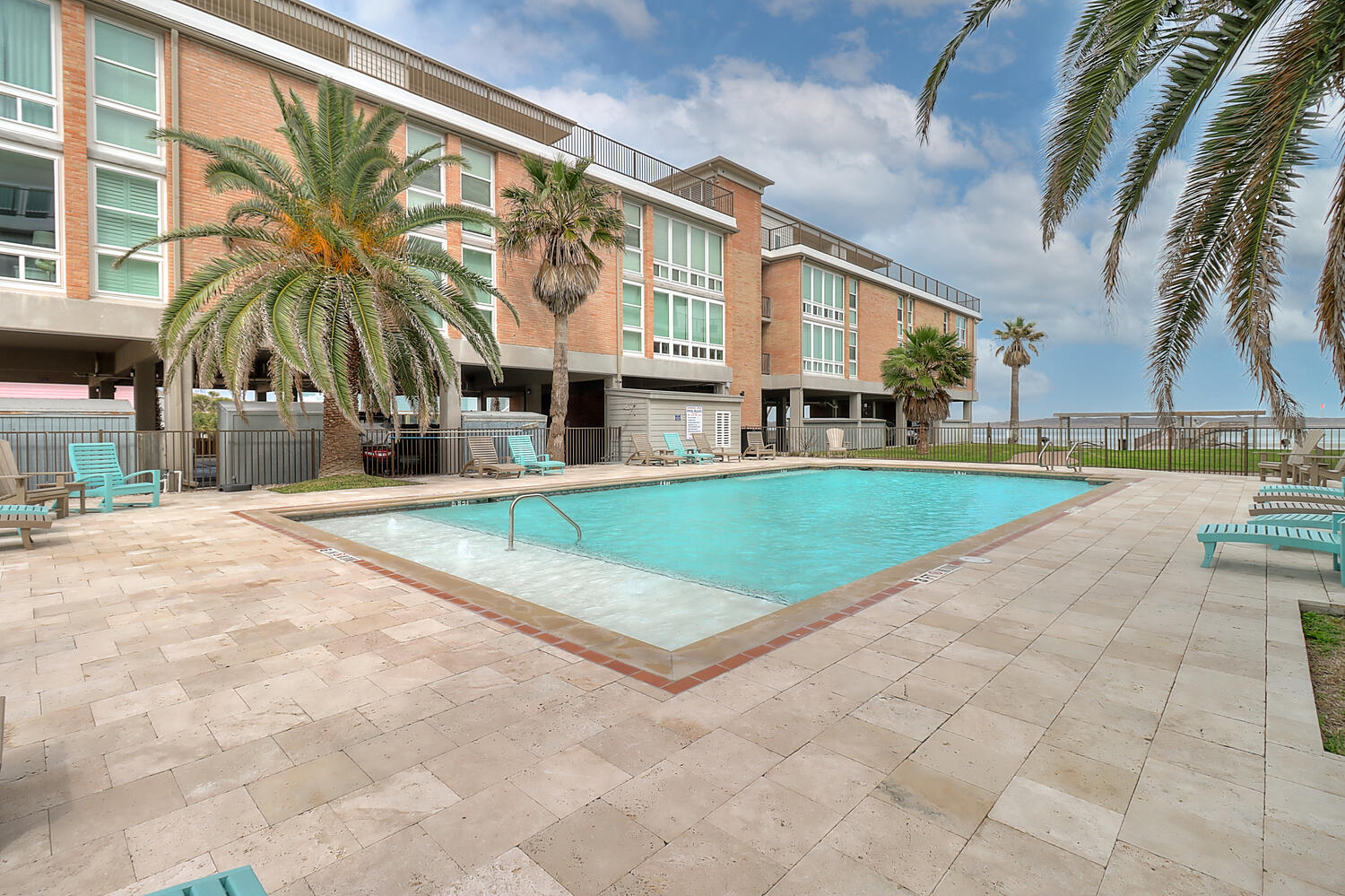 Soak Up the Sun Poolside While Taking in Tranquil Channel Views