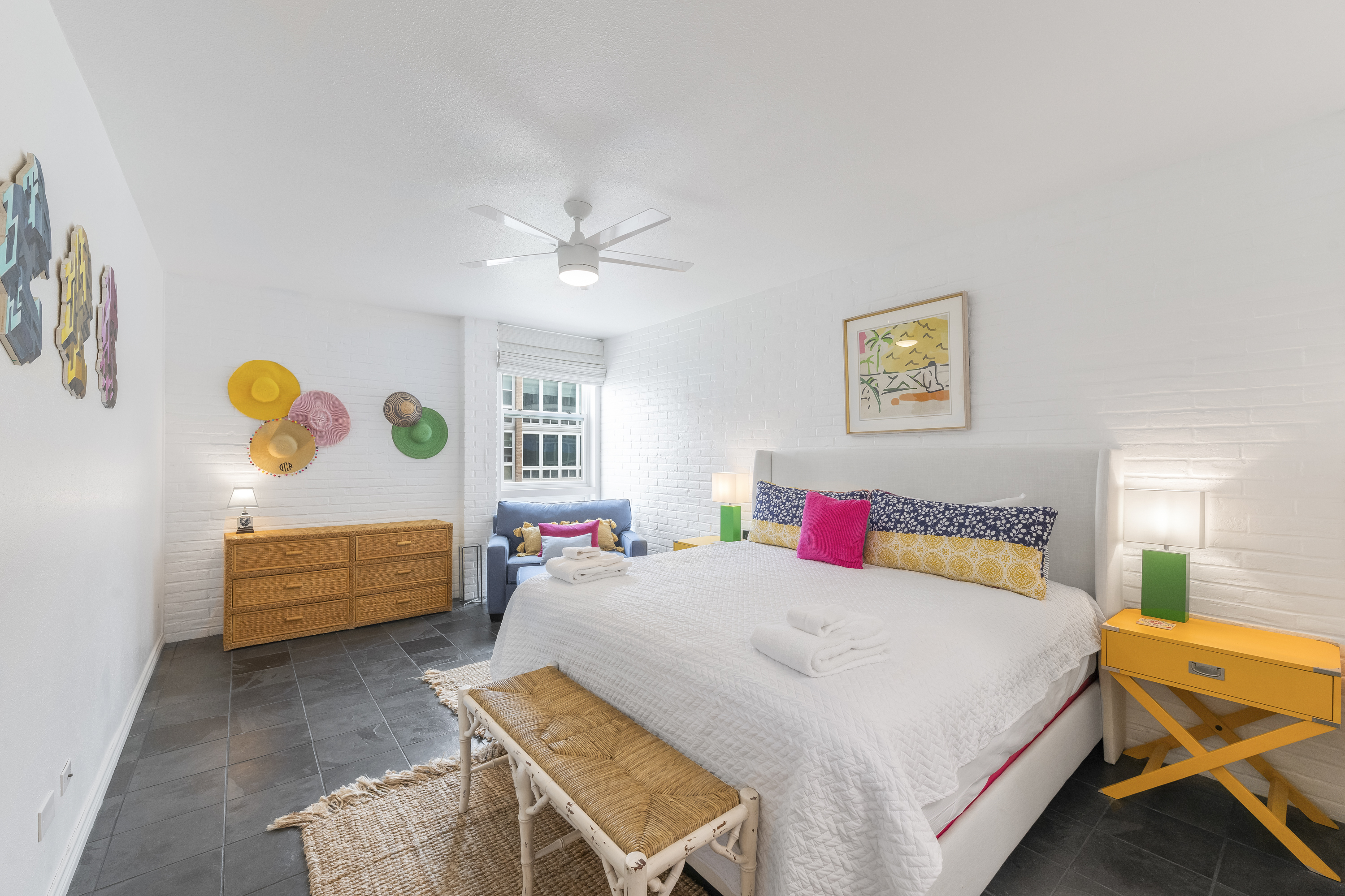 Colorful and Spacious King Bedroom with Twin Sofa Sleeper for Added Flexibility