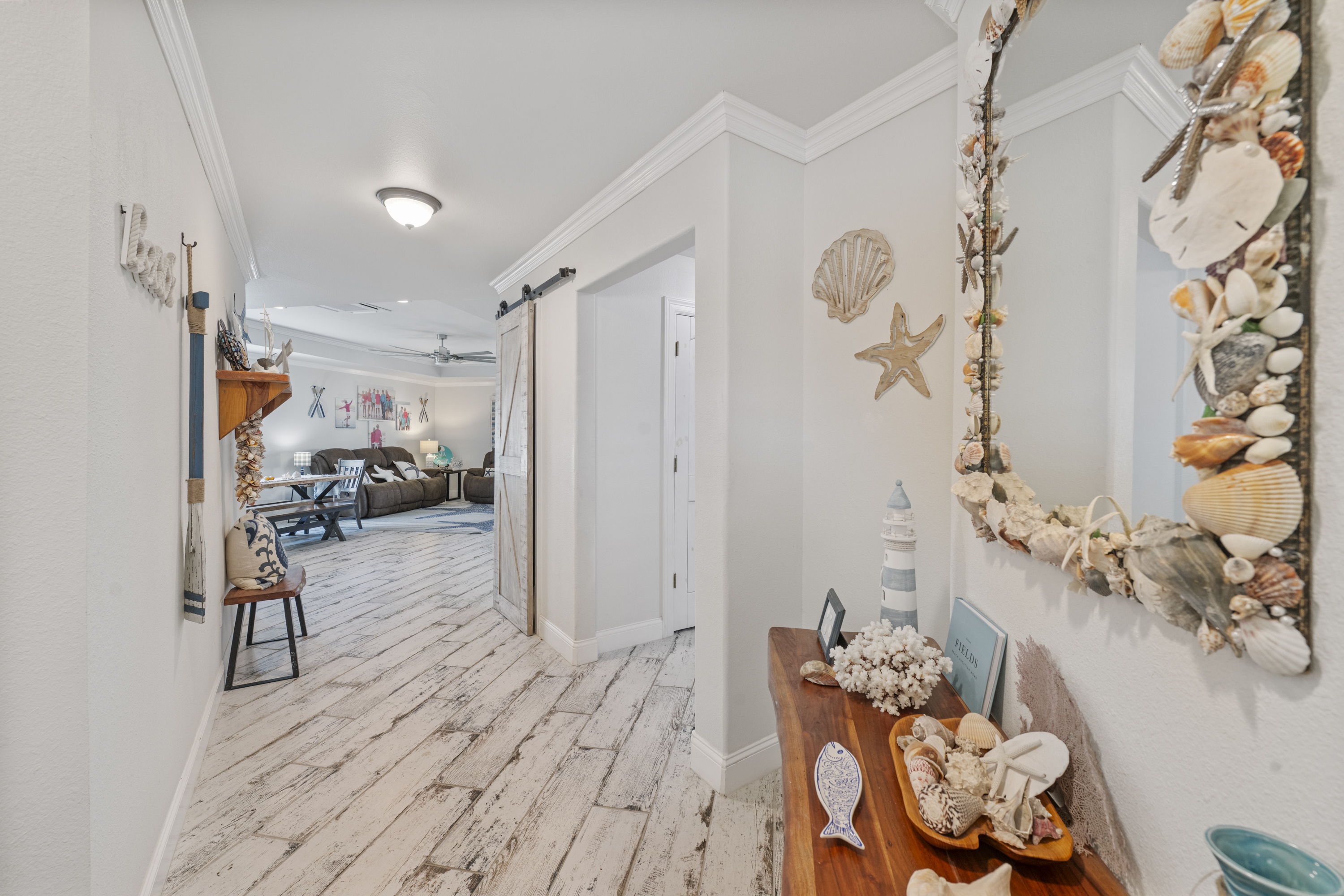 Entryway with Sightlines to Coastal-Inspired Living Spaces