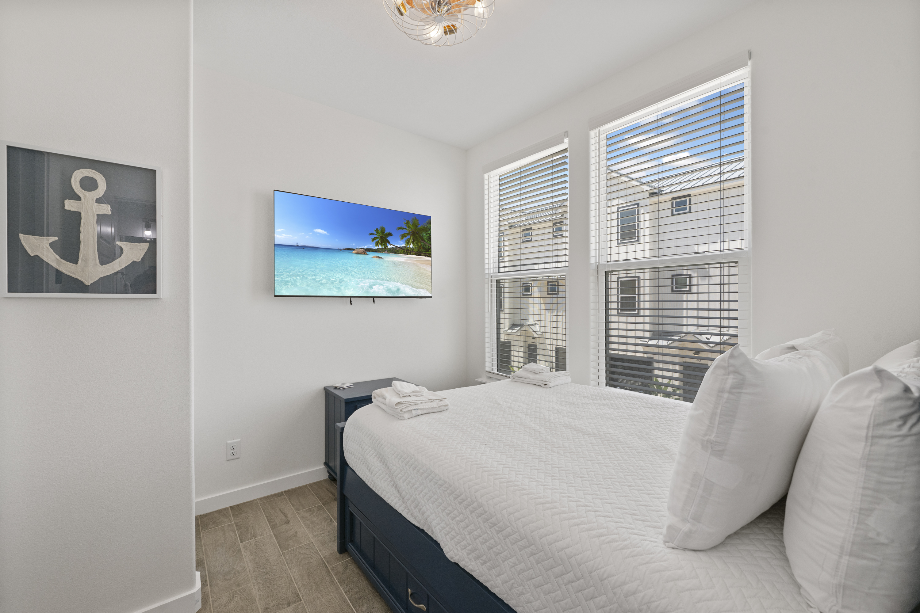 Flexible Sleeping with Shared Bath Access and Mounted TV