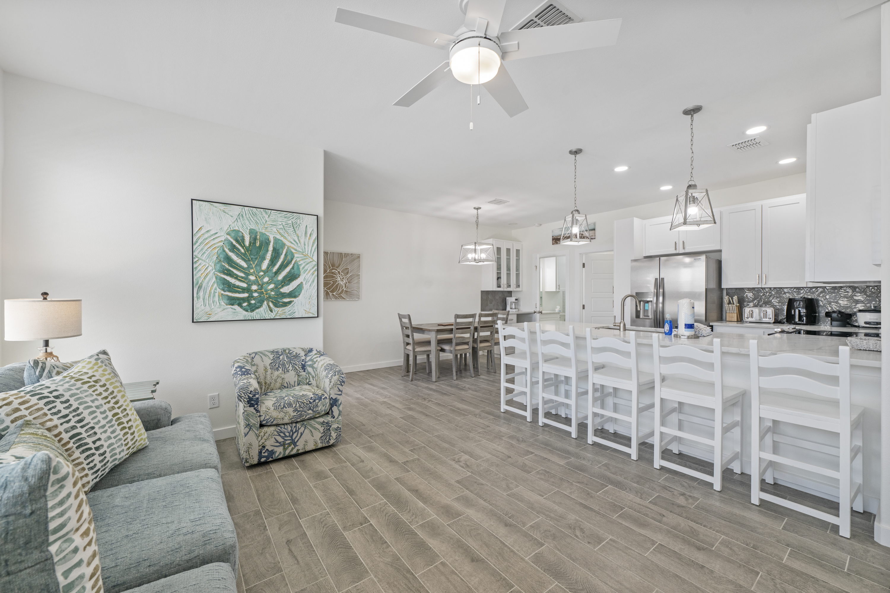 Seamless Kitchen, Dining, and Living Spaces for Everyone to Enjoy!