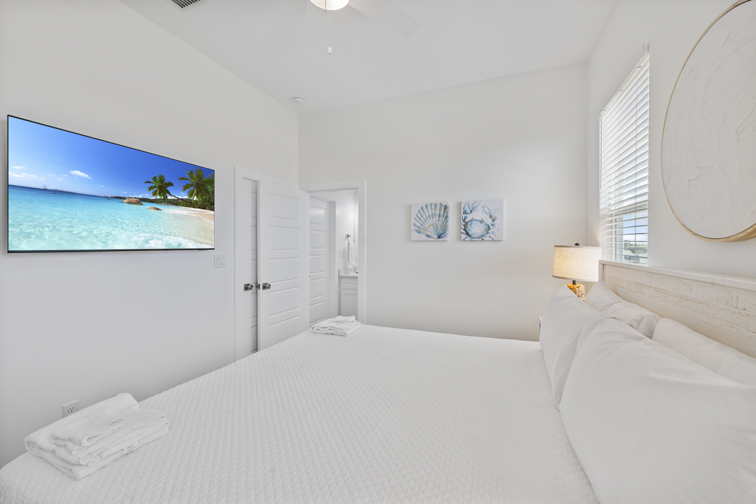 Costal Chic King Bedroom with TV and Shared Bathroom