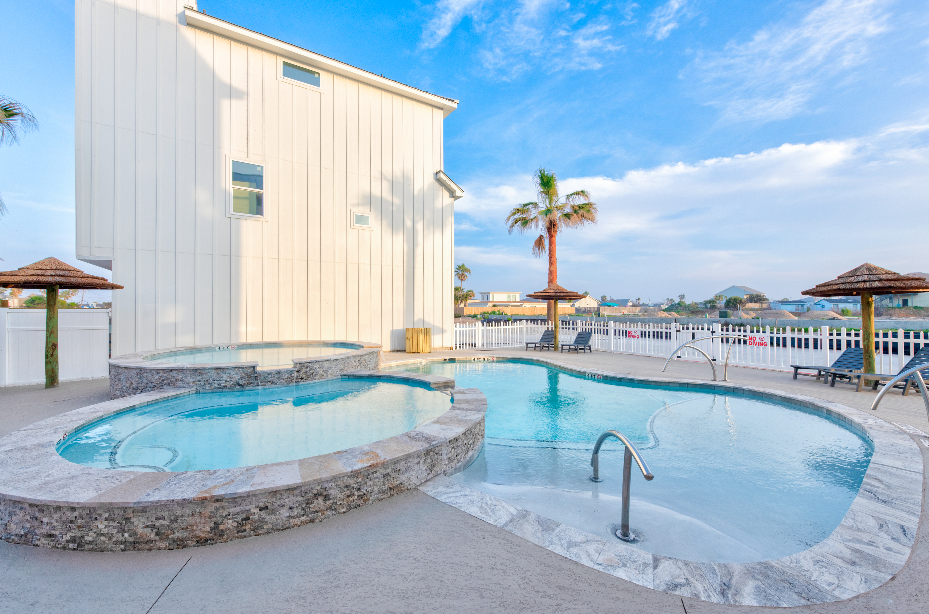 Relax and Unwind at Mango Cay: A Pool Oasis Awaits