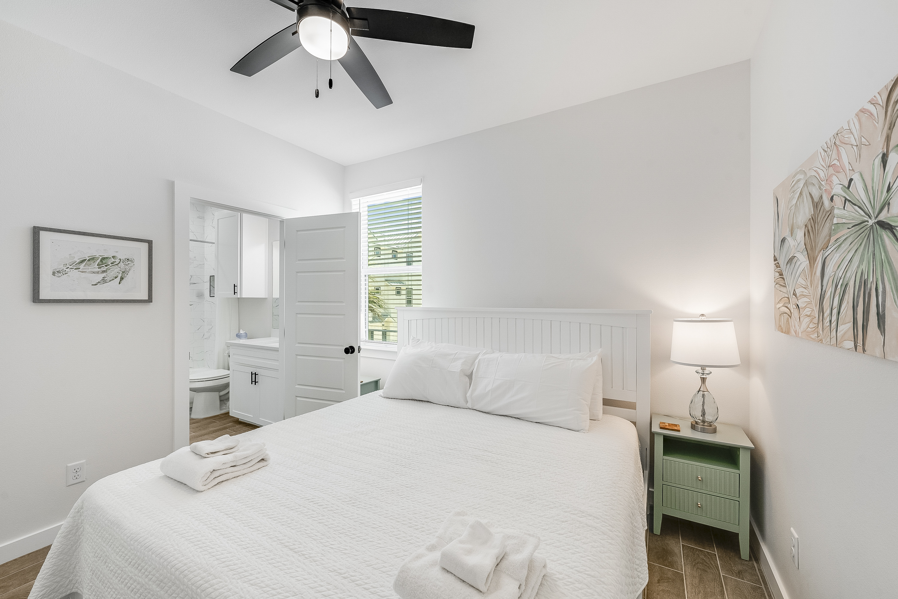 Relax in Style: King Bedroom with Shared Adjoining Restroom 