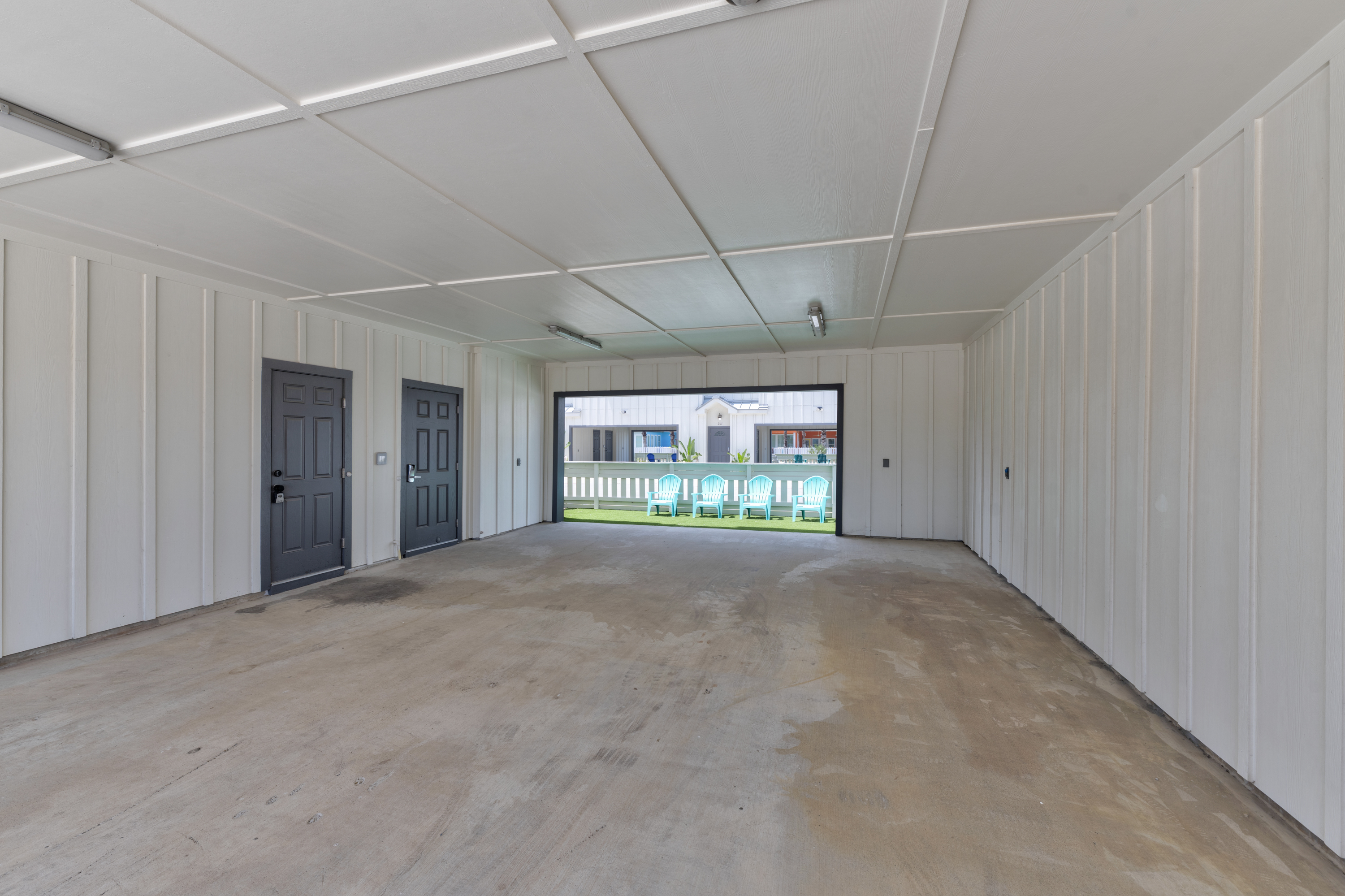 Spacious carport that will accommodate up to four midsize cars. 