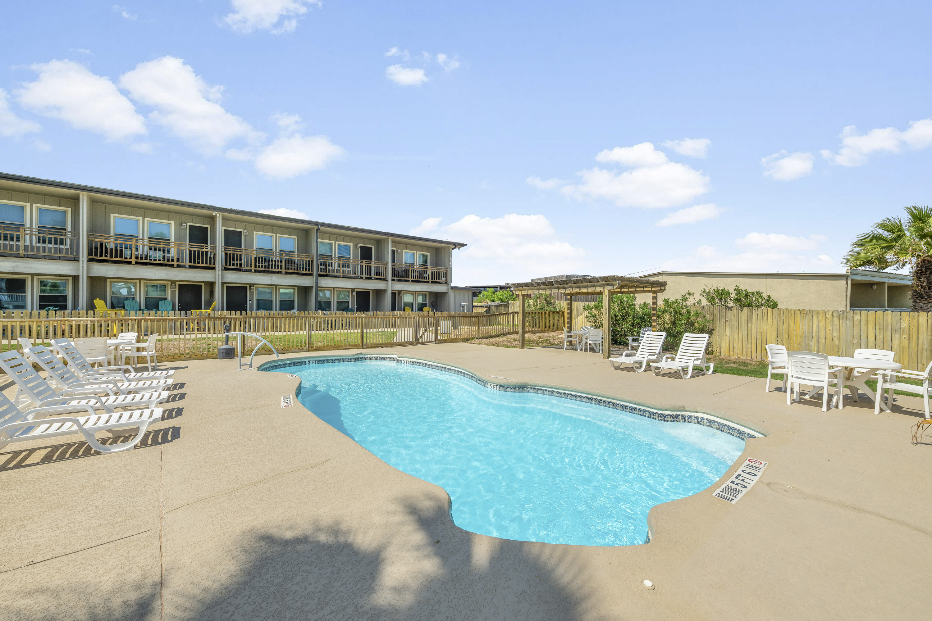 Dive into relaxation at Sunrise Villa #108 and enjoy sunny days by the spectacular community pool!