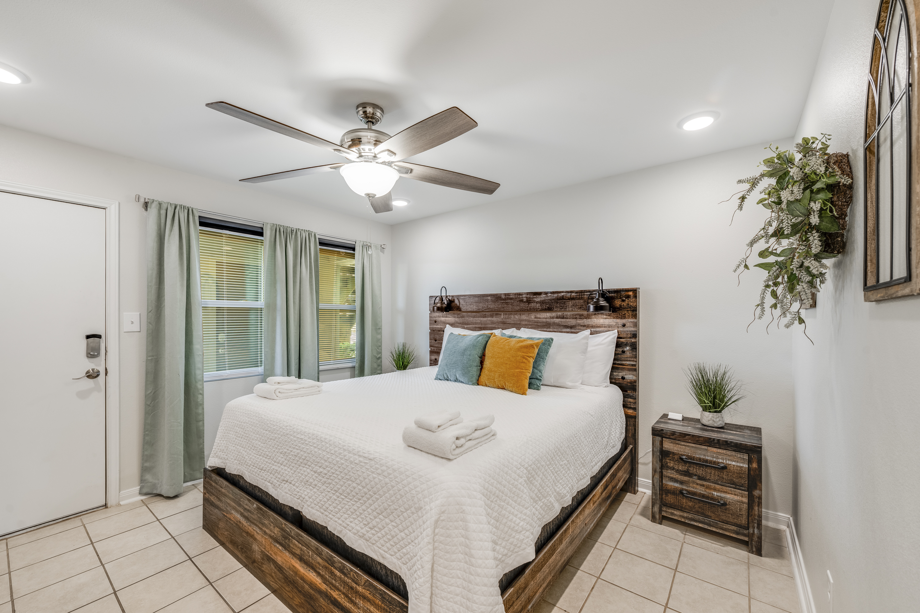 Enjoy a king size bed with easy access to the outside through a private door.