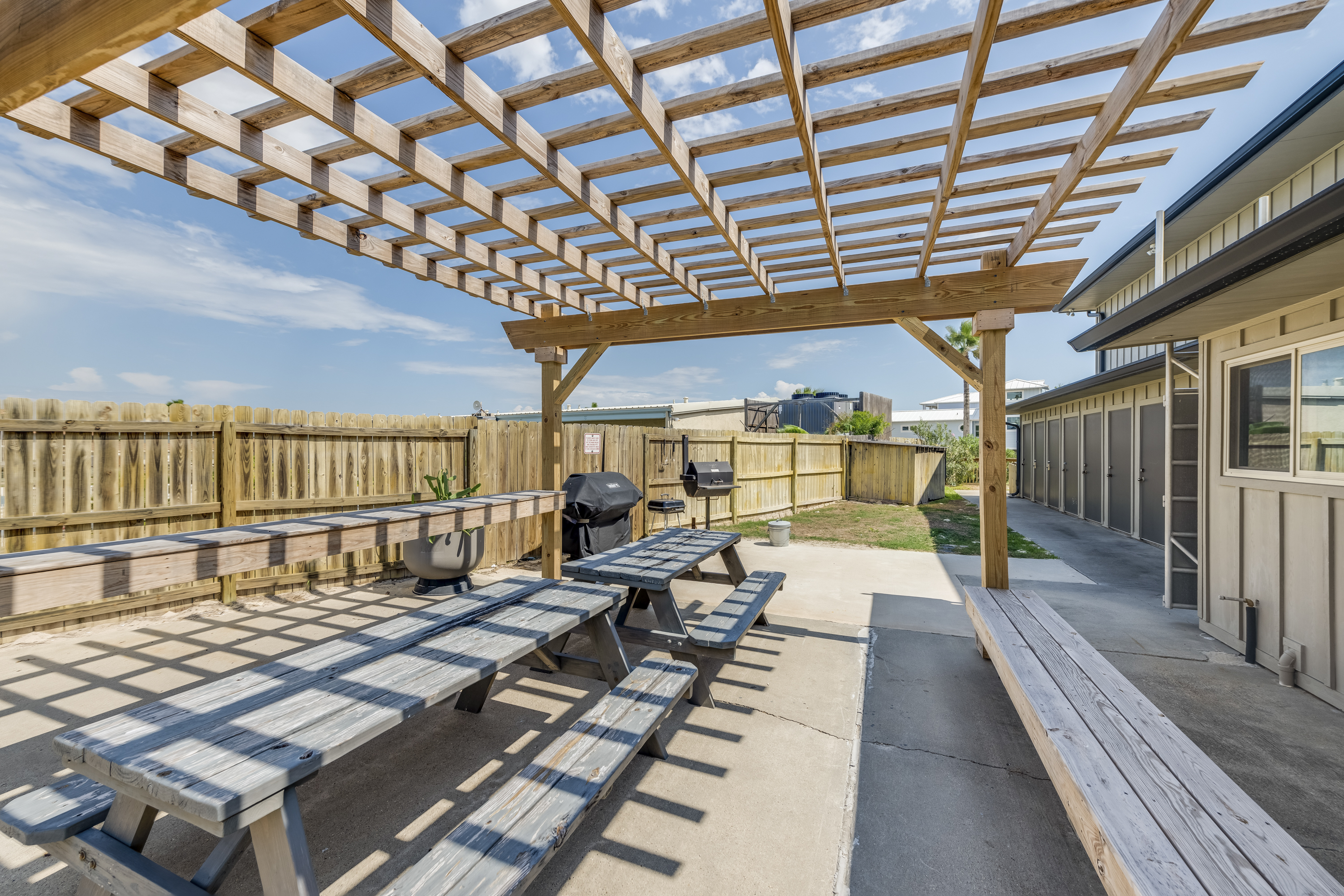 Courtyard vibes: grill up your favorites, chill out, and enjoy dining under the sky!