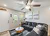 Spacious living area with a sofa sleeper and flat screen TV