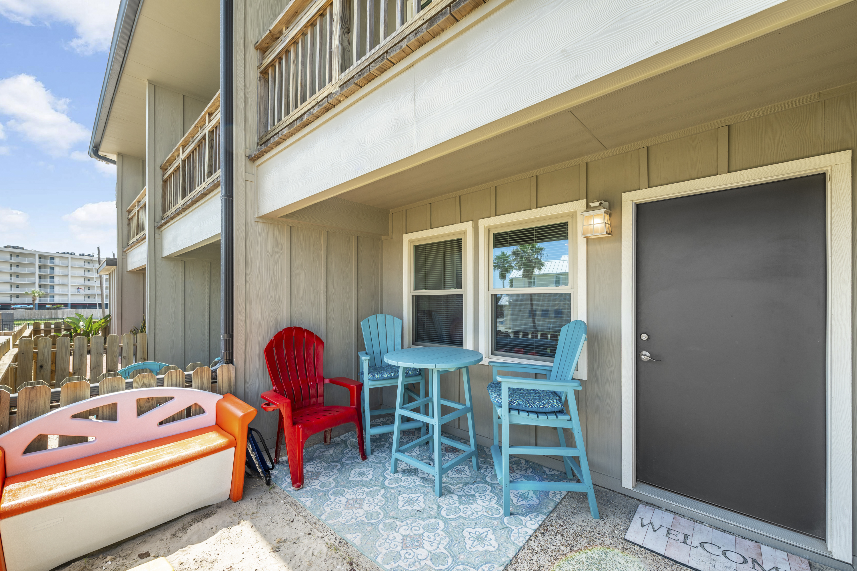 Spacious patio with direct access to the community pool.
