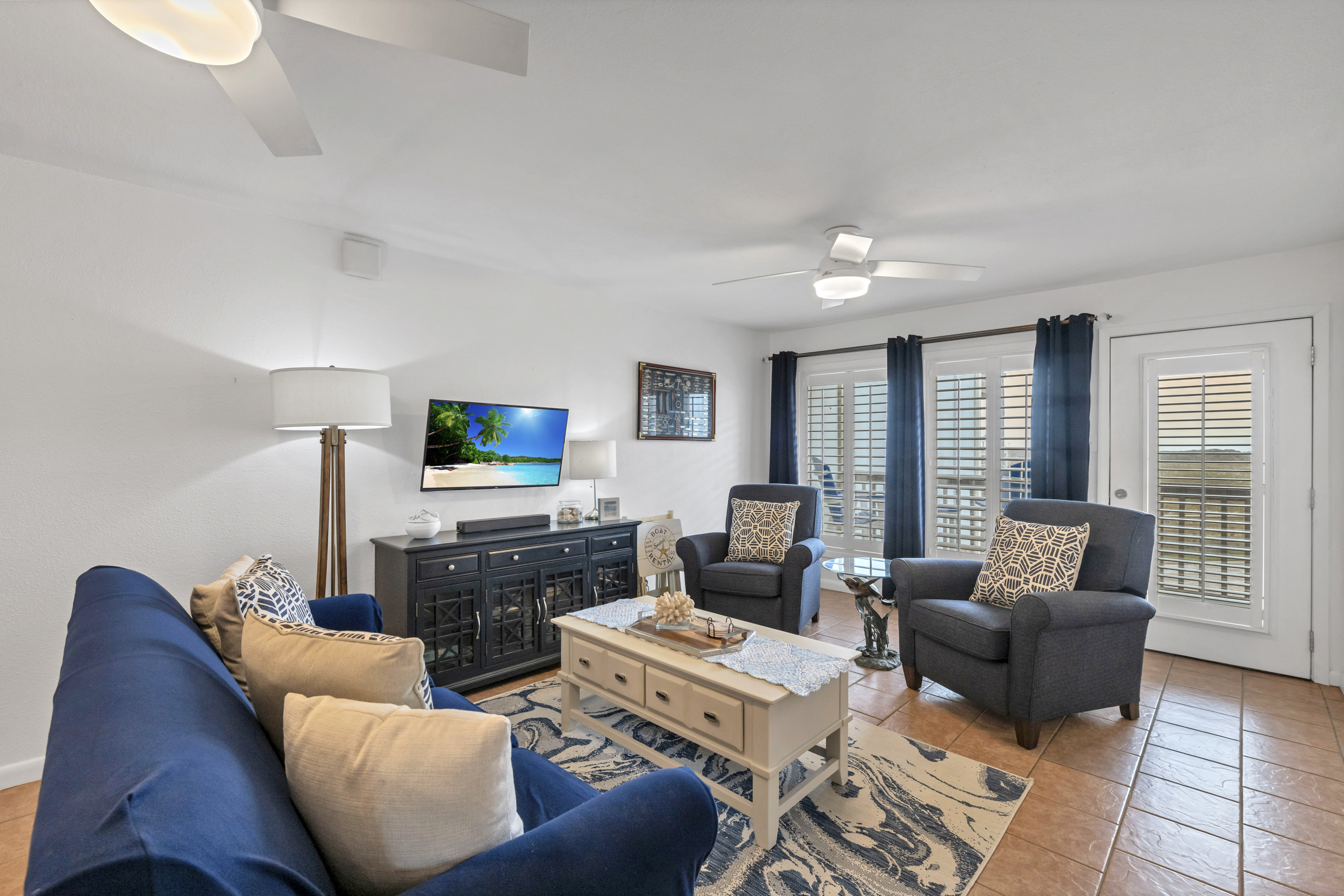 Settle into this stylish coastal living room after a perfect day on Port A’s beaches