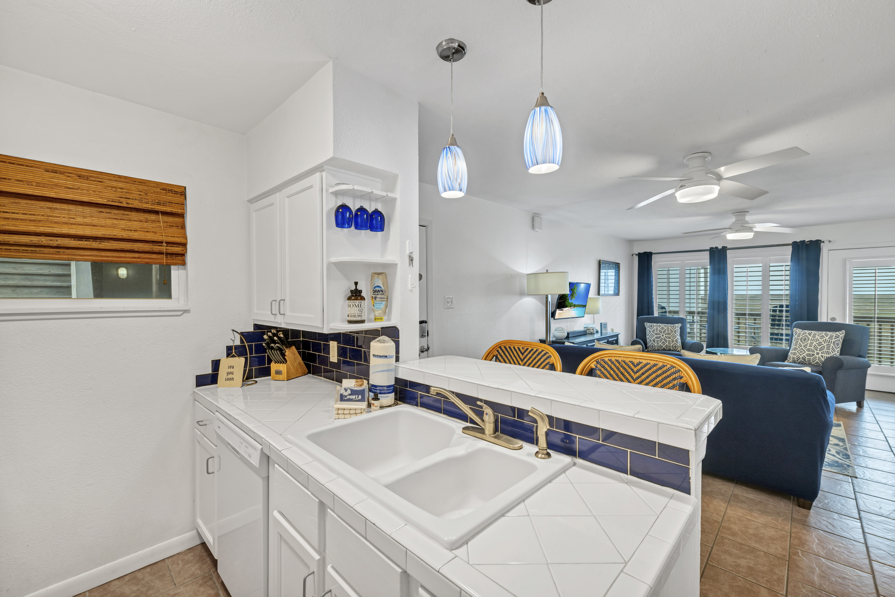 Open-concept layout connecting the living area to the kitchen