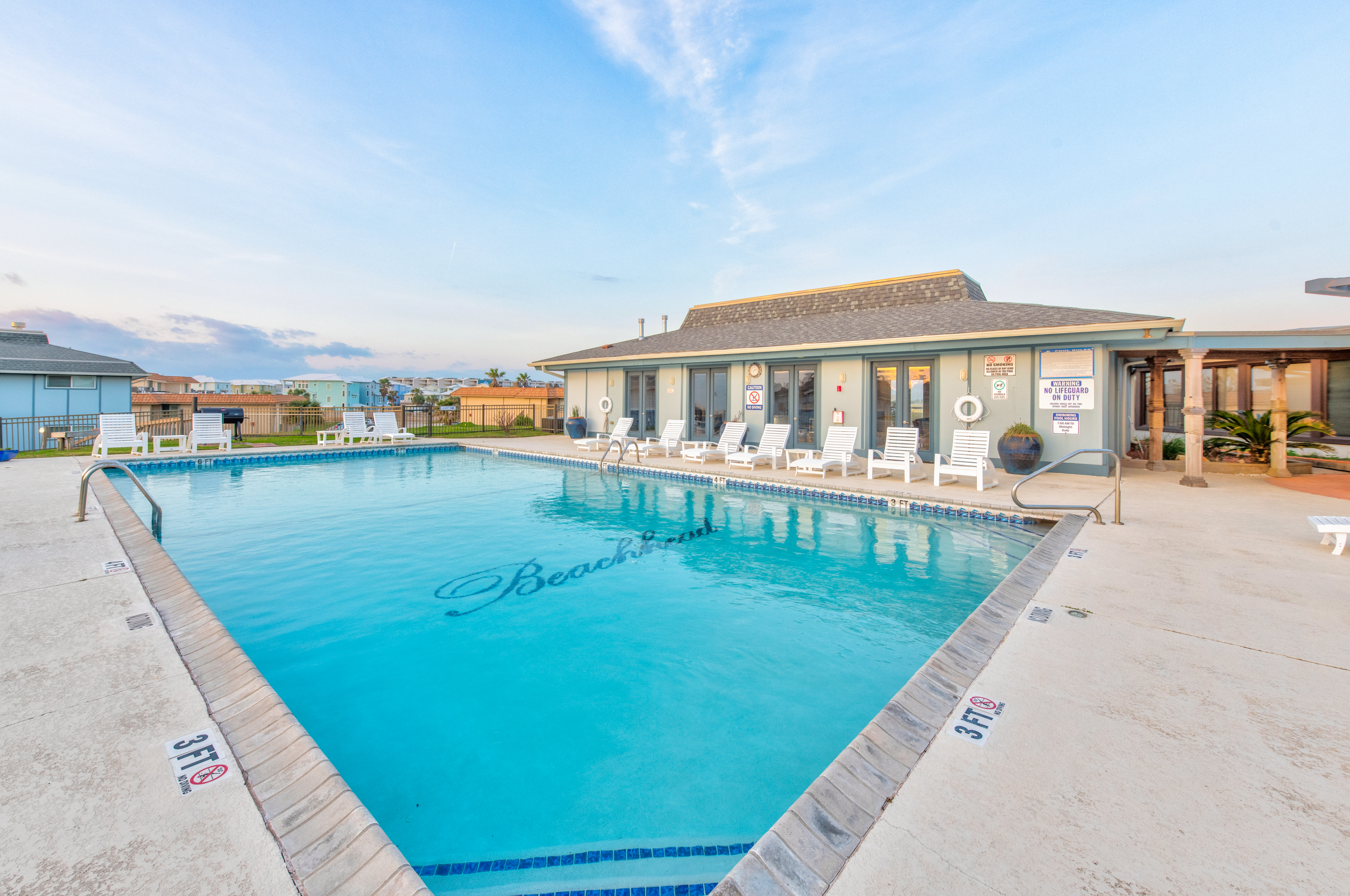 Your vacation, amplified — heated pool, lounge chairs, and island breezes