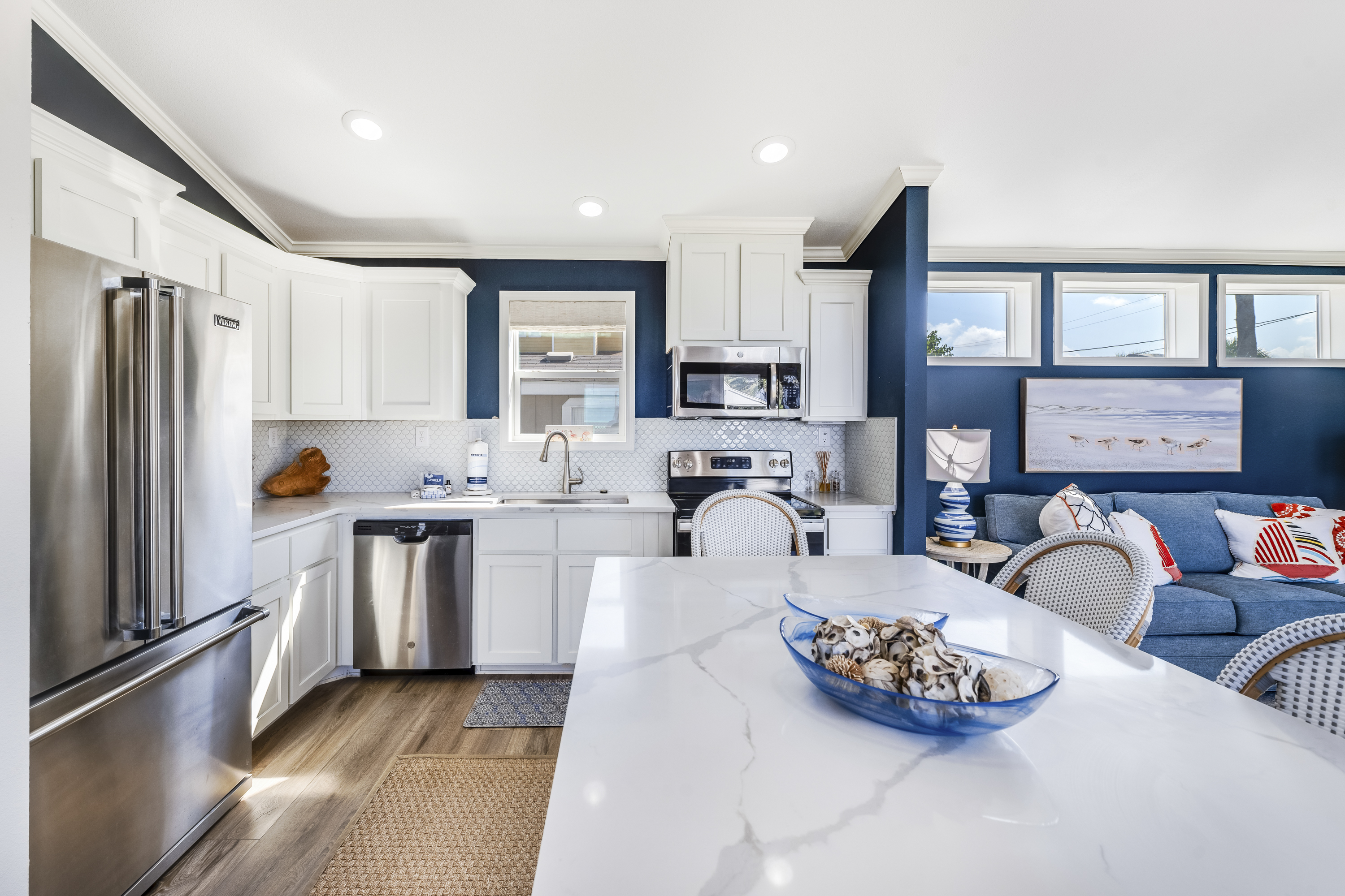 Sleek, shiny, and ready for anything. With stainless steel appliances and tons of counter space, this kitchen makes every meal a breeze!