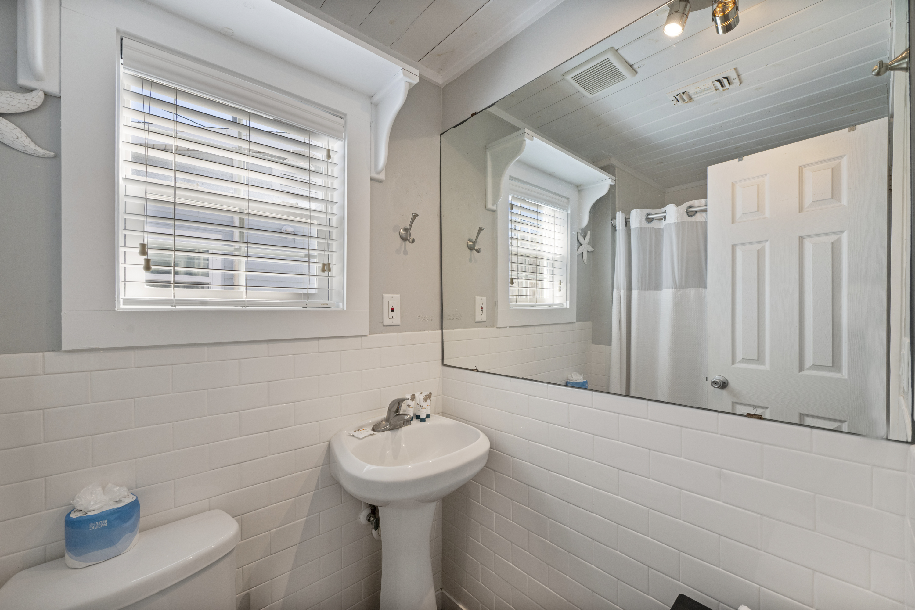 Compact but functional bathroom, designed efficiently for a small cottage