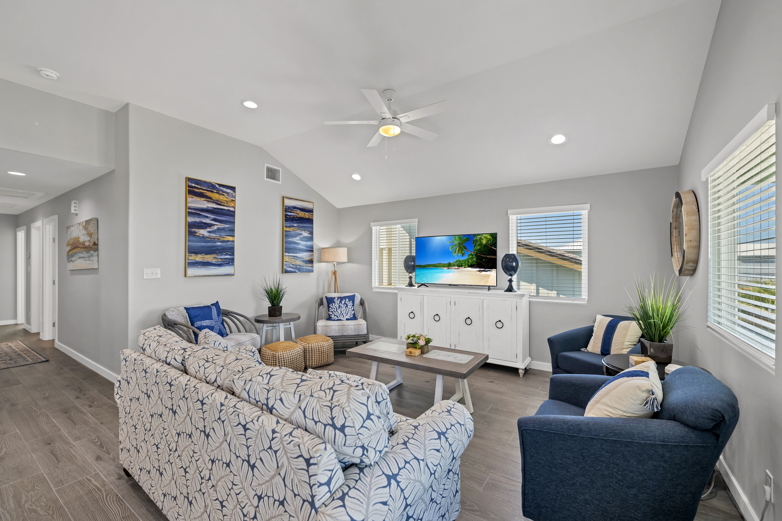 This bright, coastal-inspired living room beautifully captures a relaxed beachside feel.