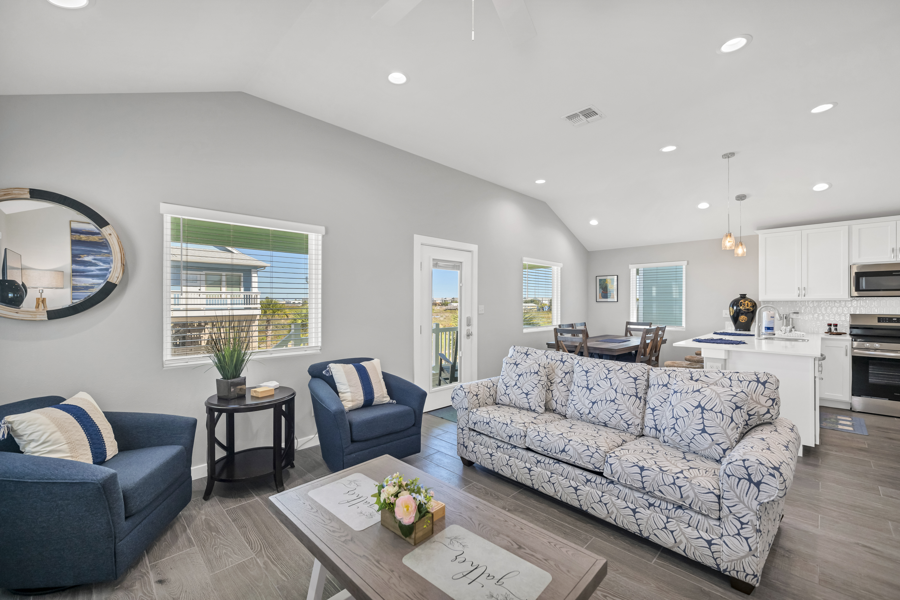 Soft, comfortable seating, and ocean-inspired details create a welcoming space perfect for unwinding after a day by the shore.