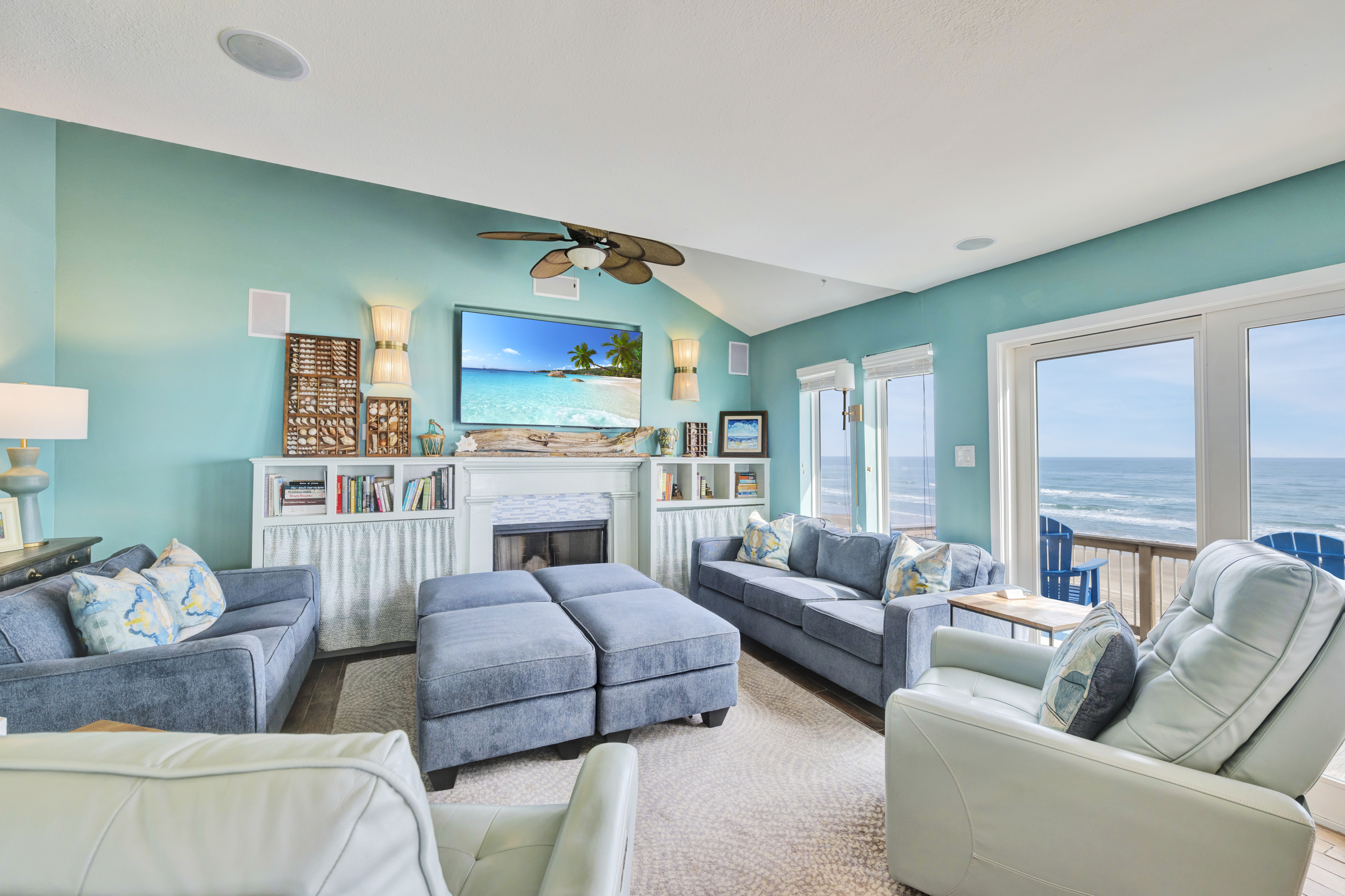 Coastal charm meets comfort in this inviting, spacious living area designed for effortless relaxation.