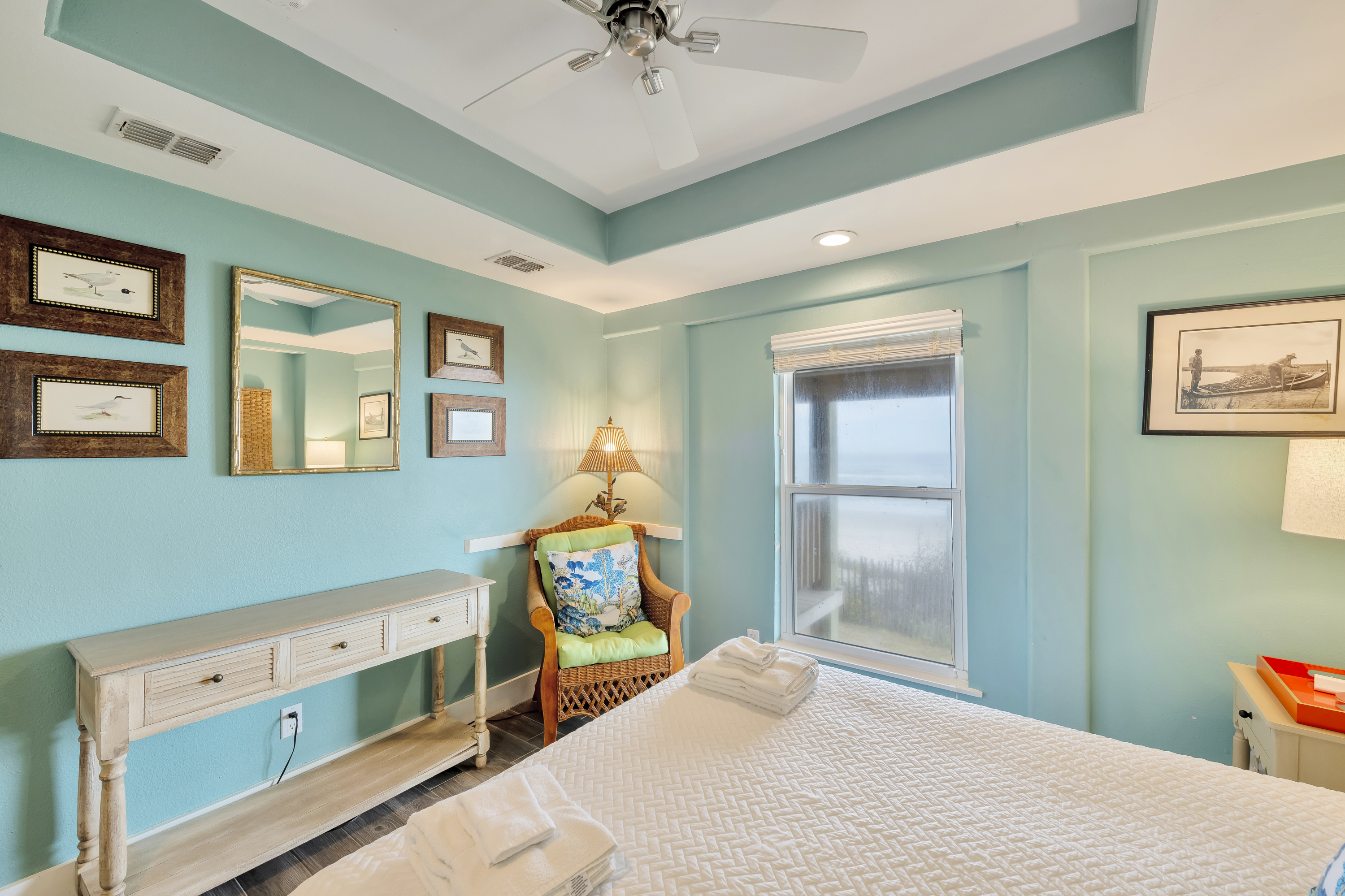 Unwind and enjoy your own sanctuary while dreaming of the ocean just beyond your window