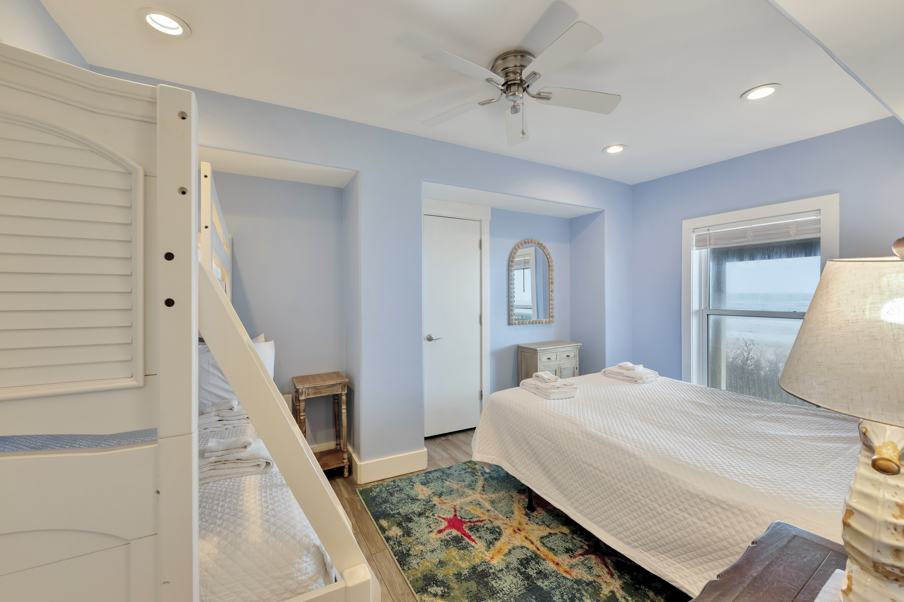 1st Floor Suite made for sharing- featuring a Queen bed and a twin over a full bunk