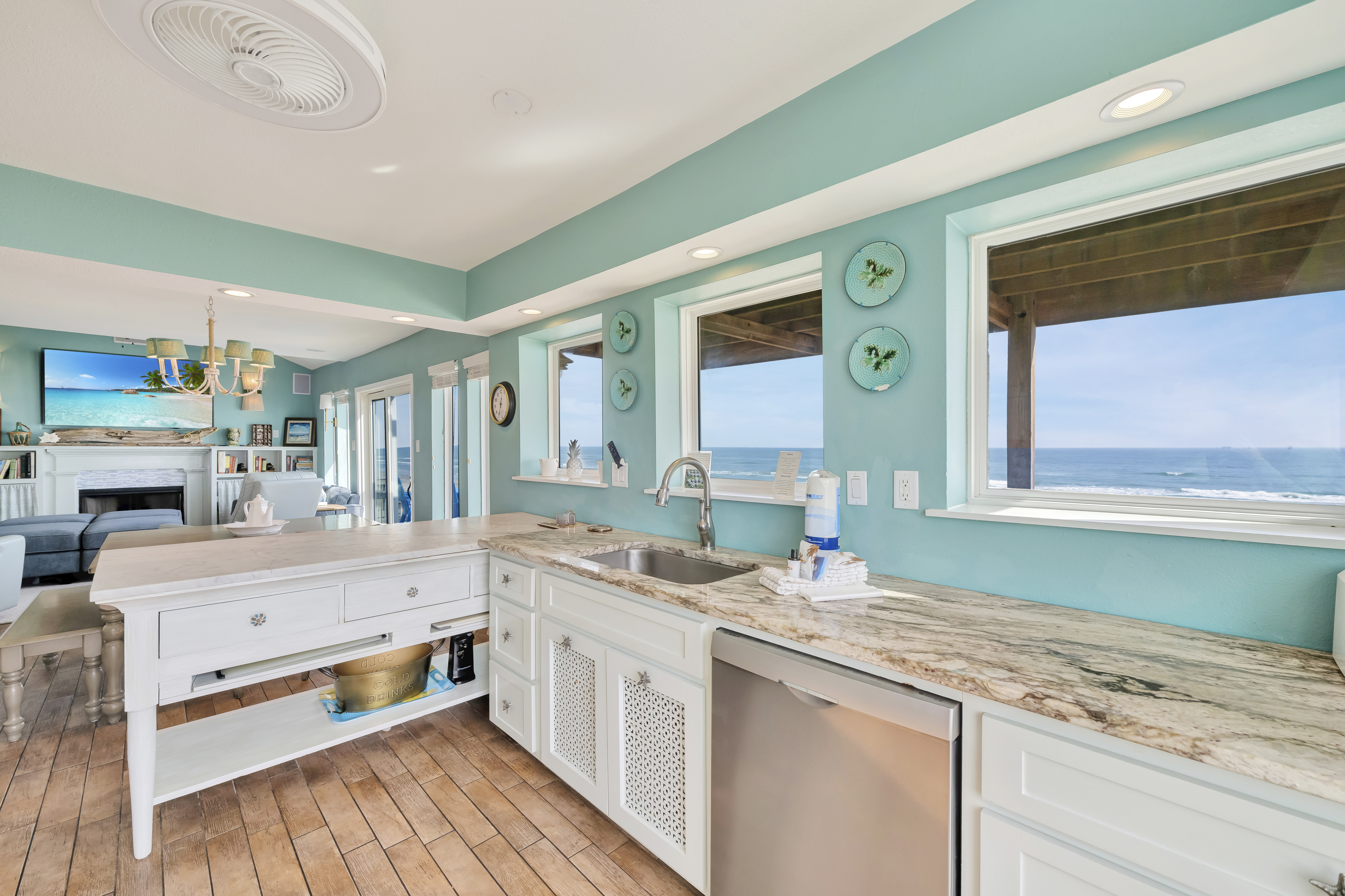 Bright, Welcoming Kitchen Opens to Social Living Spaces featuring panoramic views of the gulf!!!