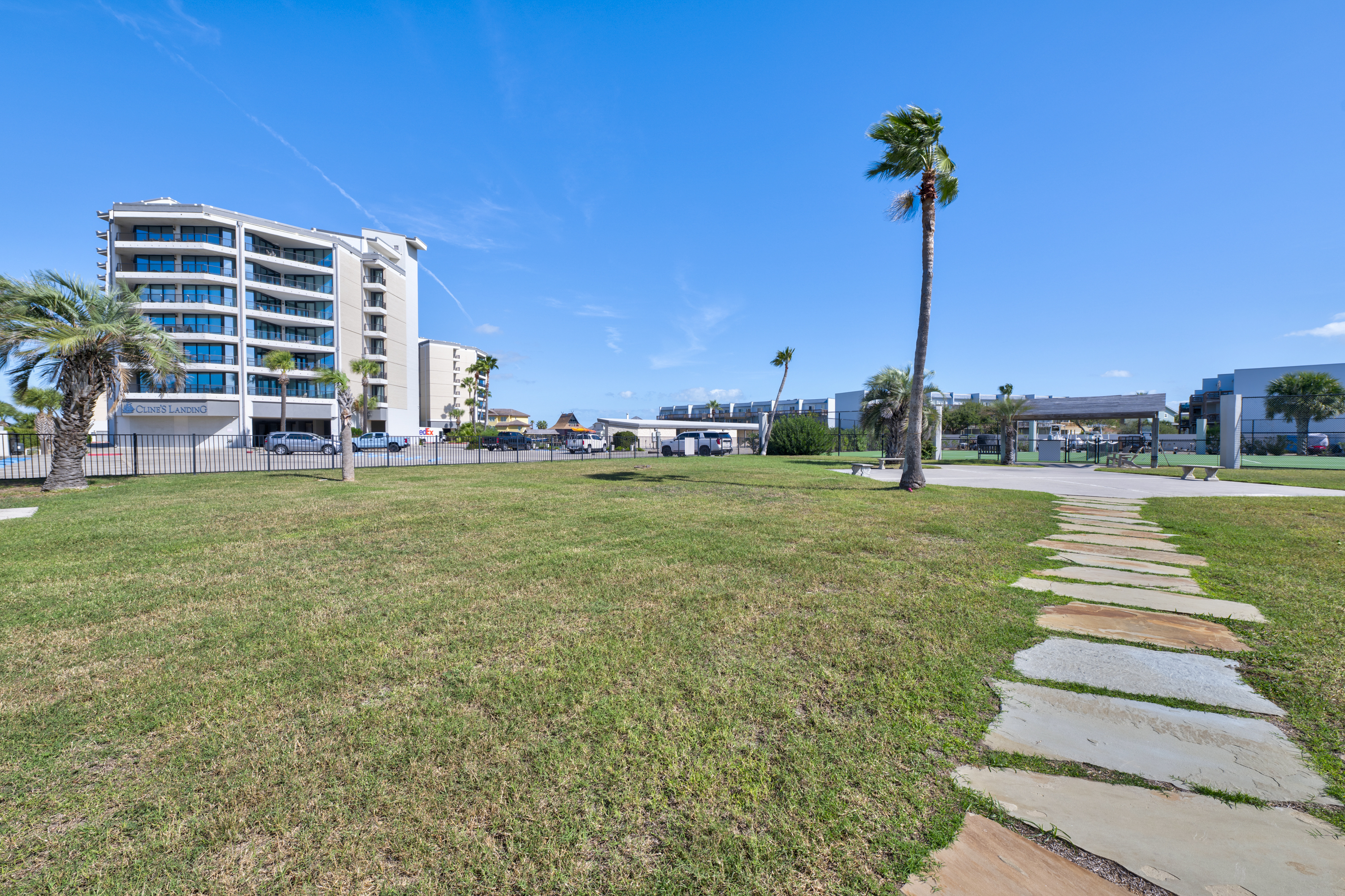 Follow the scenic pathway that leads you straight to the tennis courts, where fun and competition await