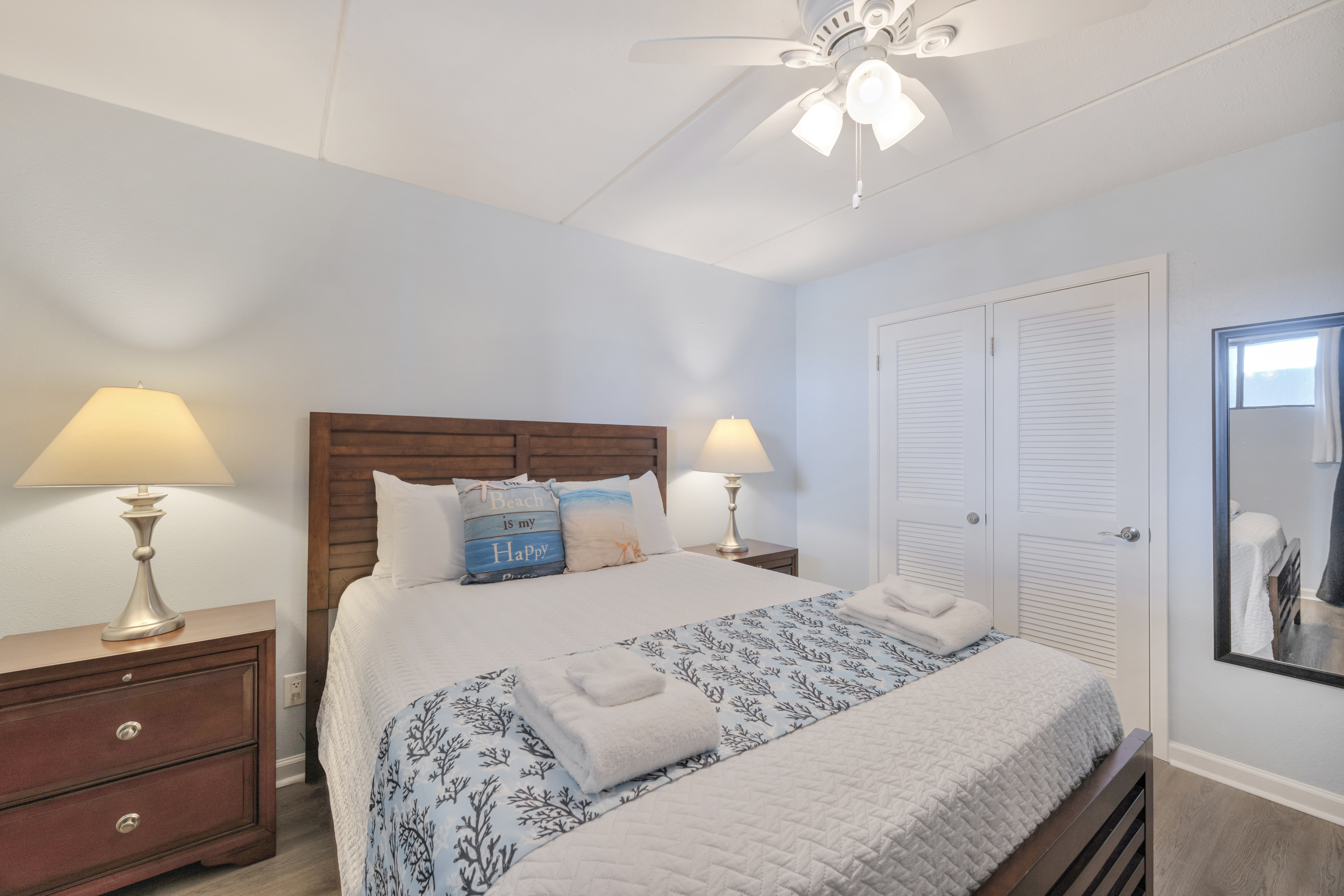 Cozy queen bedroom perfect for restful nights after endless beach adventures.